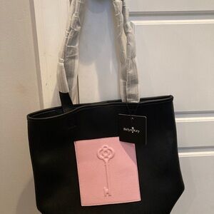 Brand new with tags leather tote. Received as gift.
